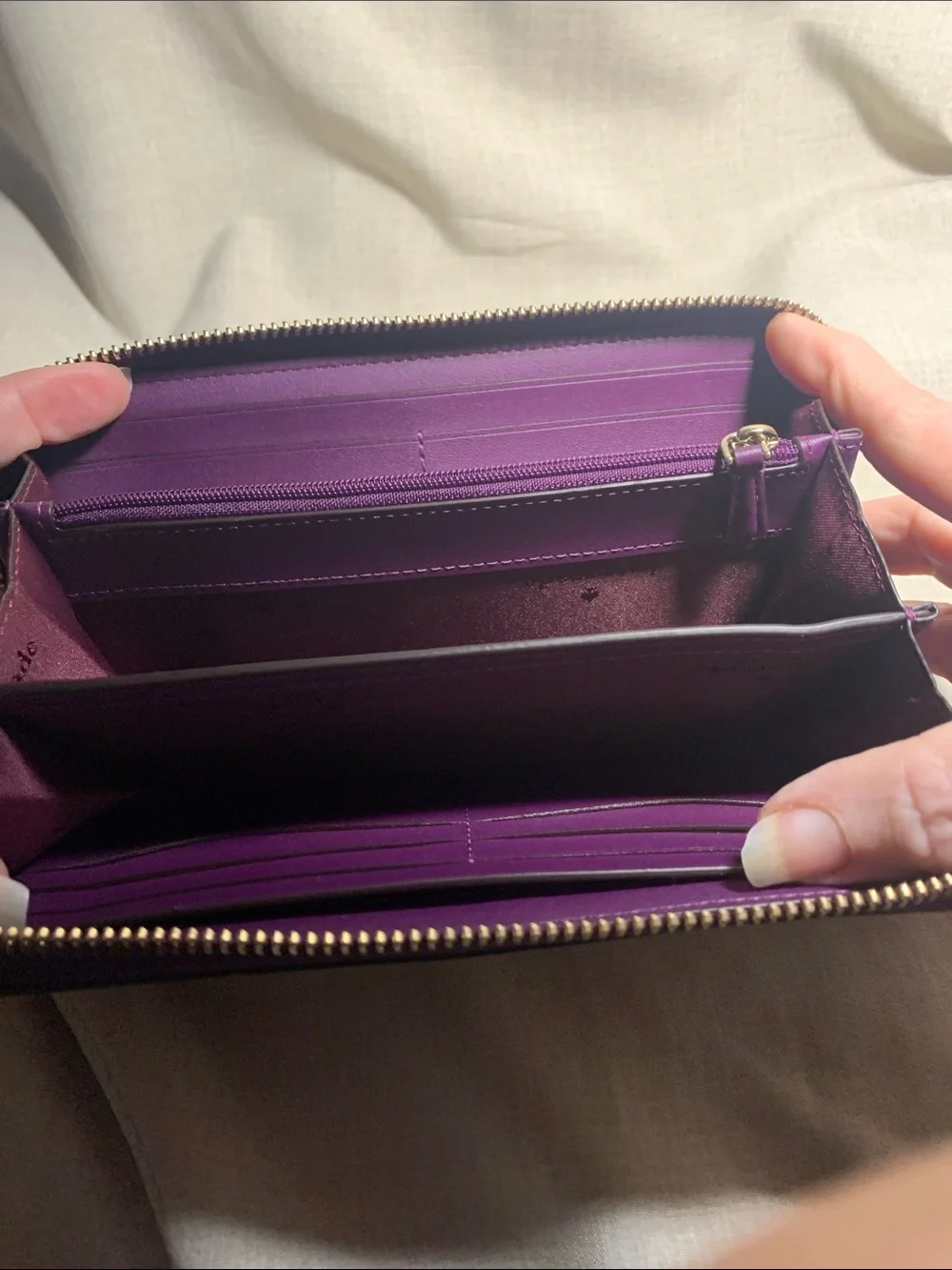 kate spade deep purple pebbled leather zip wallet